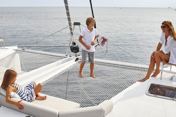 Chania: Private Day Catamaran Cruise with Swimming and Meal - Relaxing on Deck or in the Bay During the Stop