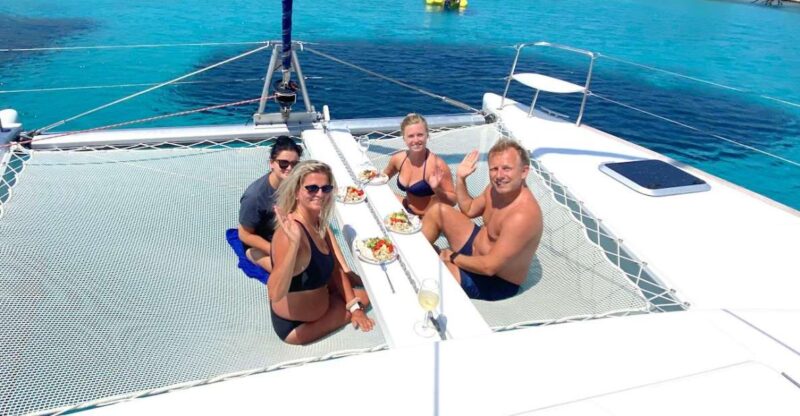 Chania: Private Day Catamaran Cruise with Swimming and Meal - Savoring a Mediterranean Feast with Unlimited Drinks