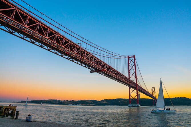 Charms of Lisbon: Alfama Tapas Tour & Sunset Sailing with Wine - Savoring Portuguese Tapas at a Traditional Tavern
