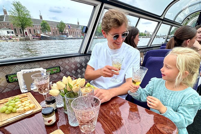 Cheese and Wine Canal Cruise through Historic Amsterdam - Key Points