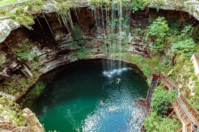 Chichen Itza, Cenote, and Valladolid Tour - Exploring the Sacred Cenote: Crystal-Clear Waters and Waterfalls