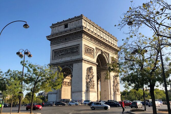 City Walking Tour: See the Top 5 Paris Highlights in a Day - The Arc de Triomphe: Napoleon’s Monument