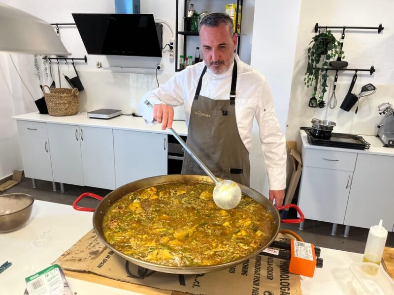 Class of Valencian Paella with welcome drinks and tapas - Dive into a Traditional Valencian Paella Cooking Class for $63