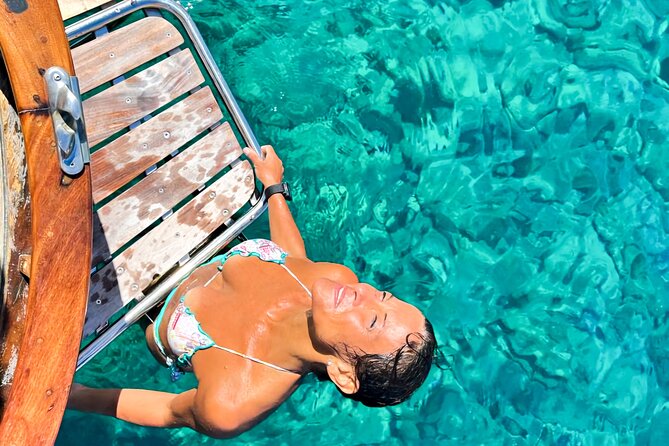 Classic boat tour to Tavolara and Molara with lunch. - Swimming in the Piscine Naturali di Molara
