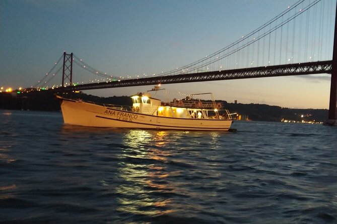 Classic Yacht Sunset group tour in Lisbon with welcome drink - A Relaxing Sunset Cruise for a Unique Lisbon Perspective