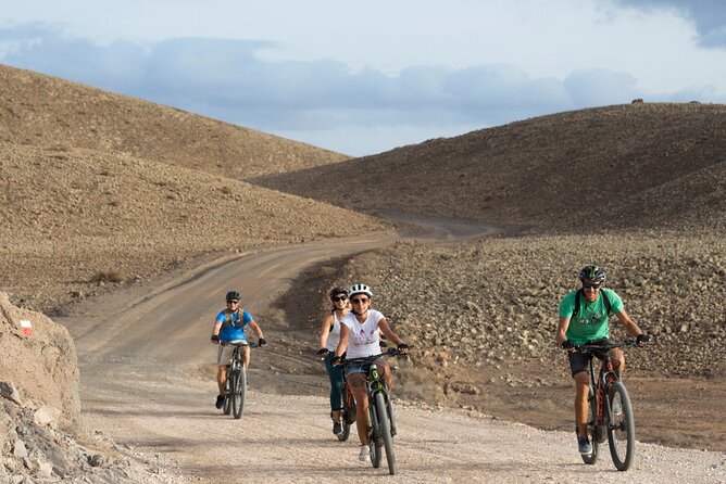 Coast to Coast PREMIUM eBike Tour; moderate level - 45 km - Cycling Through Corralejos Volcanic Massif