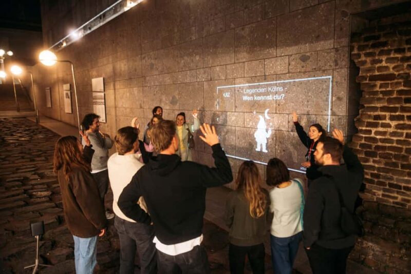 Cologne: Cologne Cathedral & Old Town in the evening  interactive tour with projector - Starting Point Near Cologne Cathedral and Roman Ruins