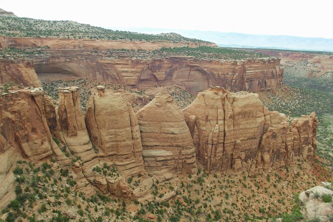 Colorado National Monument Self Guided Audio Driving Guided Tour - The Colorful Layers of Book Cliffs at Viewpoint
