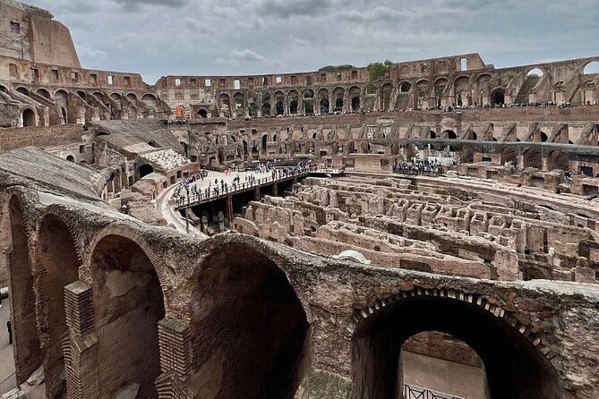 Colosseum & Ancient Rome Access with a Host - Walking Through the Roman Forums Ruins