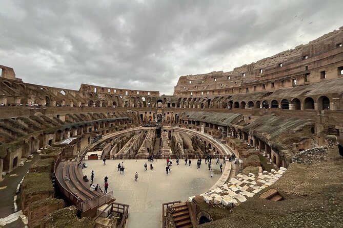 Colosseum, Roman Forum, Palatine Hill Experience - The Iconic Colosseum: Gladiators and Engineering Marvels