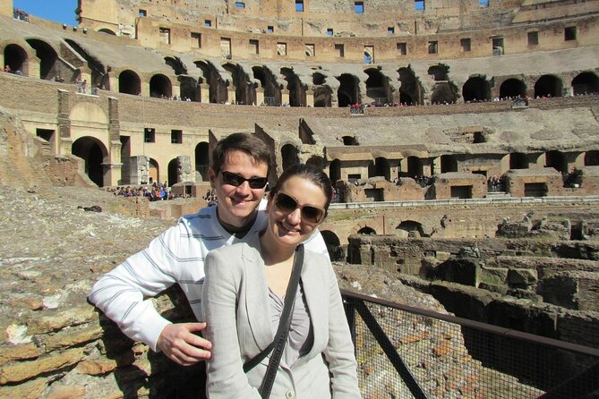 Colosseum with Arena & Roman Forum Guided Tour - The Colosseum: From Gladiator Arena to Ancient Wonder