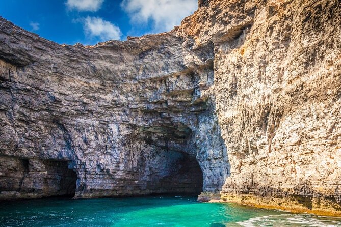 Comino Highlights, Blue/Crystal Lagoon & Caves Private Boat Trip - Visiting Comino’s Bays: San Nikolai and San Marija