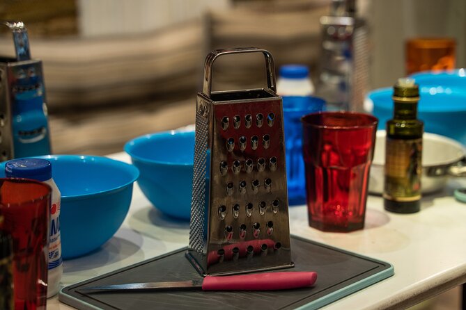 Cooking Class in Athens with Shopping in Central Market & Lunch - Wine, Water, and the Dining Atmosphere