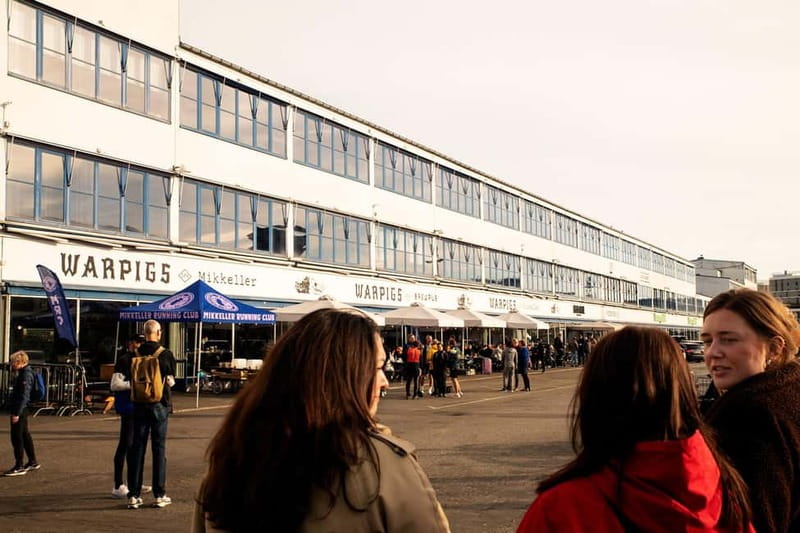 Copenhagen: Small Group Neighborhood Tour With Beer & Pubs - Visiting a Favorite Local Bar with an Extensive Beer Selection