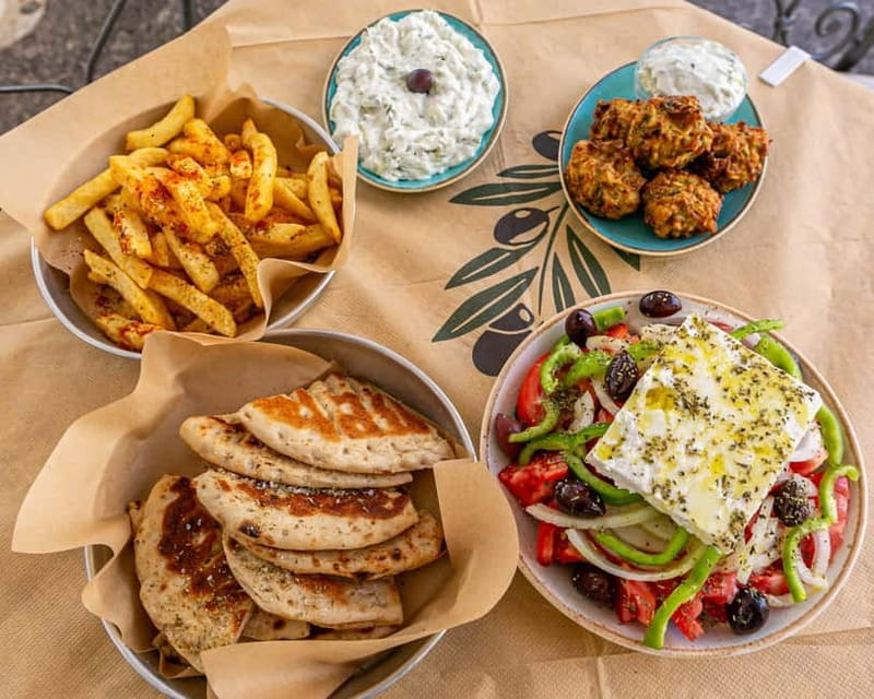 Corfu: Old Town Food and Culture Walking Tour - Wrapping up at the Local Restaurant with Wine and Beer
