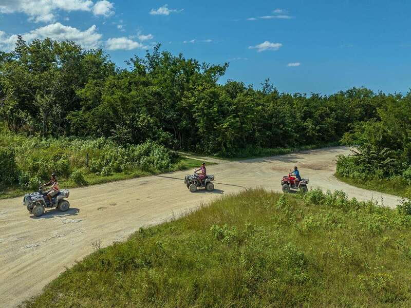 cozumel: ATV adventure with caverns, ruins with transfer - Riding ATVs Through Jungle Trails to Jade Cavern