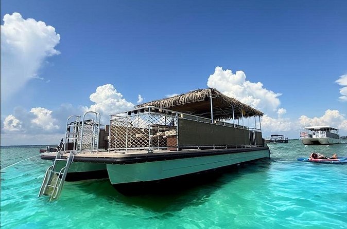 Crab Island Swim Aboard the Tipsy Tiki - Marine Wildlife and Dolphin Viewing Opportunities