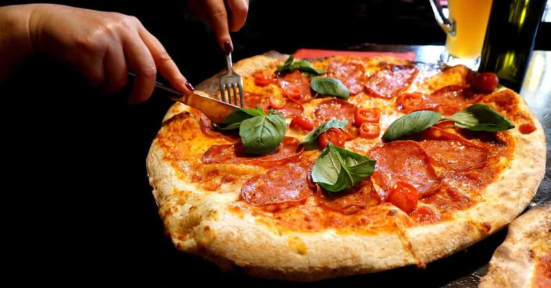 Create, Cook, Taste: Your Custom Pizza Course at La Stazione! - The Tasting Experience and Sharing the Pizza