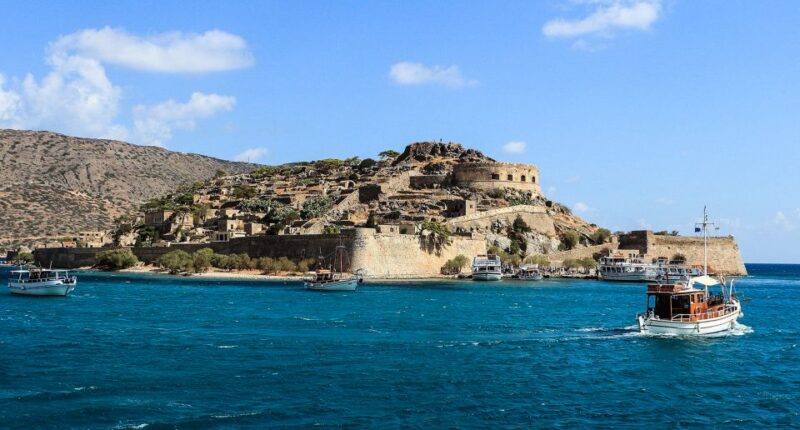 Crete: Day Trip to Agios Nikolaos and Spinalonga Island - Discovering Spinalongas Fascinating History
