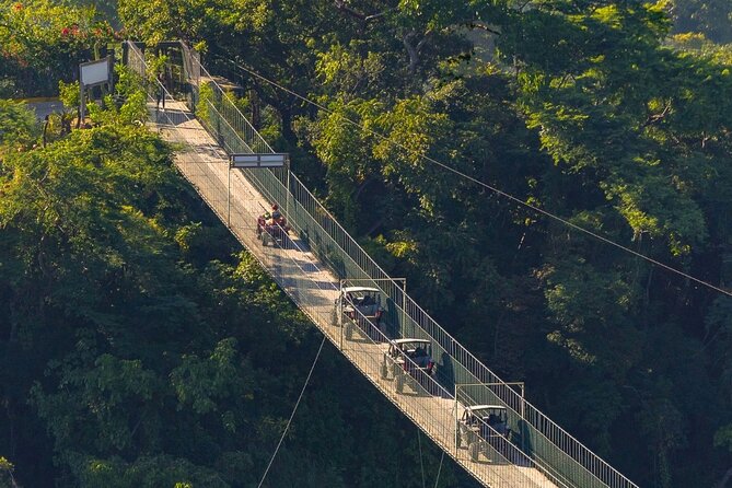 Cross the vehicle bridge with waterfall in RZR ATV - Meeting Points and Accessibility