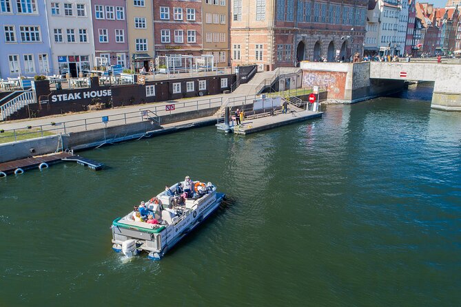 Cruises on the Motlawa River by a luxury catamaran - Gdask from the water side - Gdansk’s Waterway Tour Starts at the Green Bridge