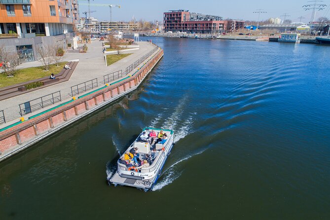 Cruises on the Motlawa River by a luxury catamaran - Gdask from the water side - Exploring the Motlawa River Embankment and Its Historic Walls