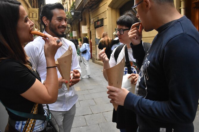 Cultural Walking Tour in Barcelona with Food & Wine Tasting - Roman Foundations at Muralla Romana and MUHBA Temple dAugust