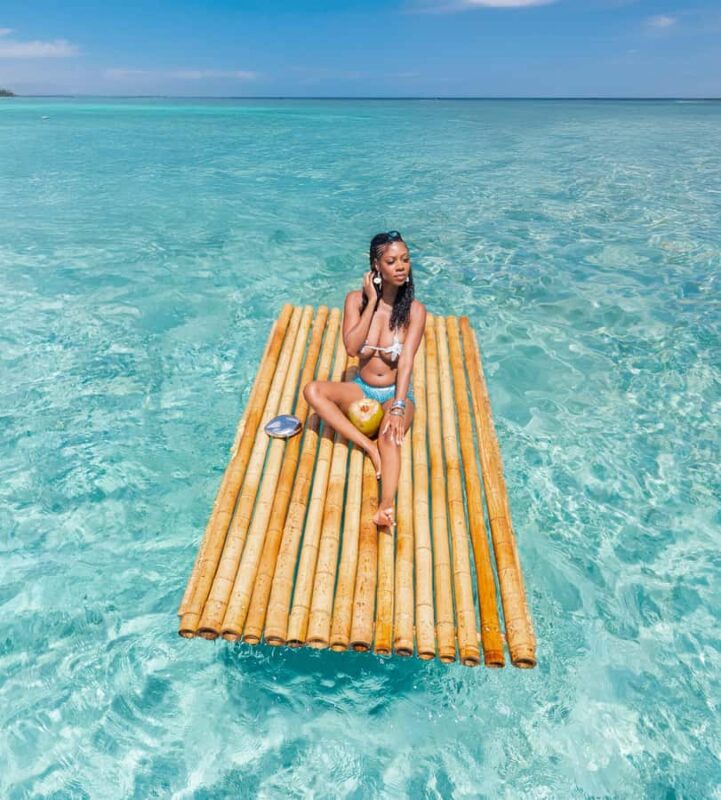 Curaçao: Bamboo Photoshoot with Cocktails - Glide Over Turquoise Waters on a Custom Bamboo Raft