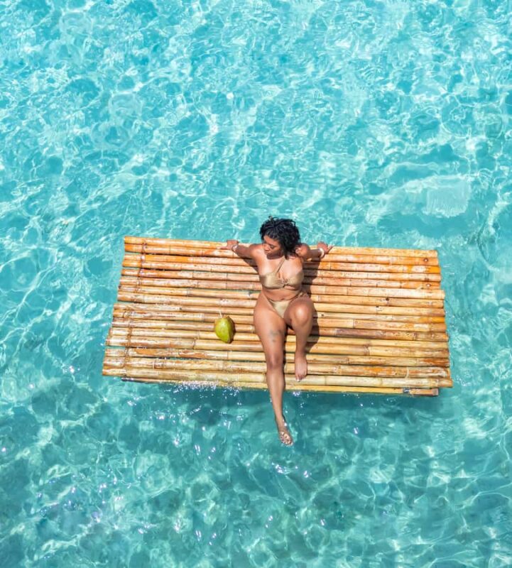 Curaçao: Bamboo Photoshoot with Cocktails - Sipping Cocktails and Enjoying Fresh Coconut