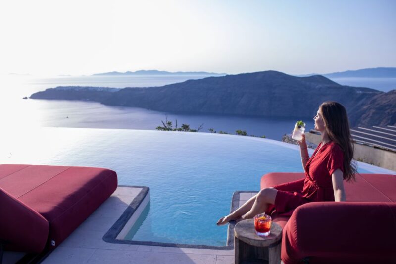 Daybed Relaxation with infinity pool use with caldera views - What’s Included in the Price