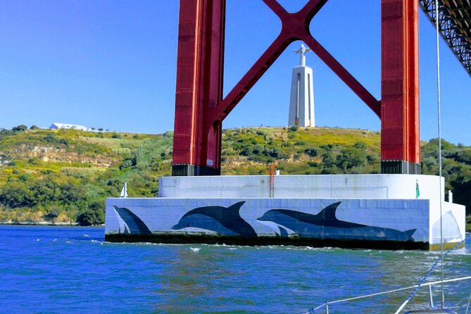 Daytime/Lisbon Sunset Boat with history and wine (small group) - The Sum Up: A Scenic and Relaxing Sunset Cruise