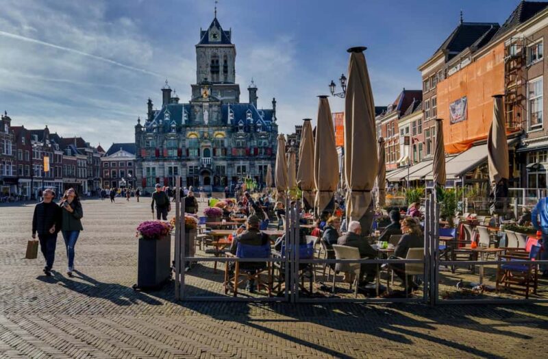 Delft: Private Dutch Food and Drink Tasting Tour - Enjoying a Drink at Delft’s Oldest Bar with Dutch Liquor and Bitterballen