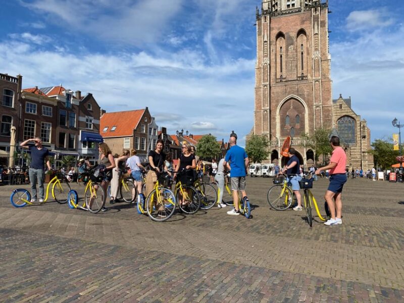 Delft - Step/scootertour in and around the city - Visiting the Old Church and the Leaning Tower