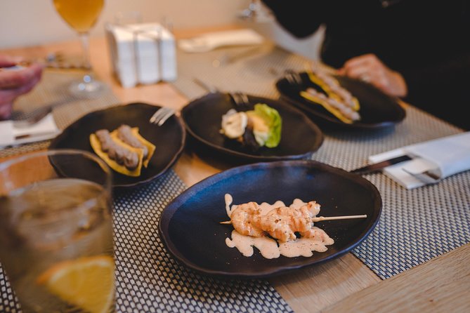 Delicious Granada Food Walk - Sampling Tapas and Beverages at a Local Bar