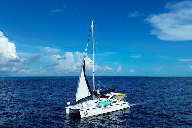 Deluxe Catamaran Tour to Isla Mujeres, from Playa del Carmen - Relaxing at the Private Beach Club with Buffet and Drinks