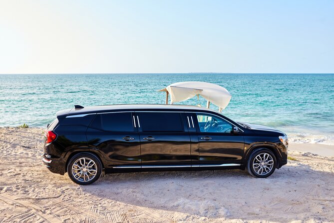 Deluxe GMC Limousine from CUN Airport to Cancun Hotel Zone - Scenic and Comfortable Airport to Hotel Zone Journey