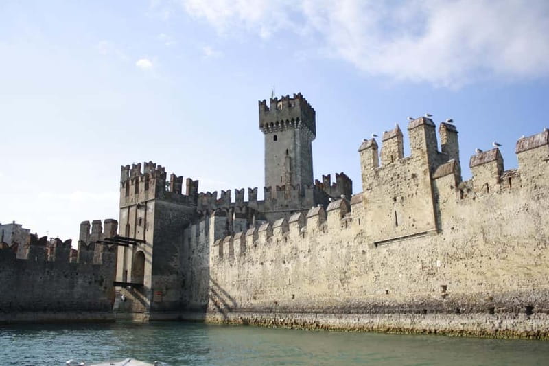 Desenzano: 1-Hour Afternoon Boat Tour to Sirmione - The Return Voyage and Sunset Prosecco Experience