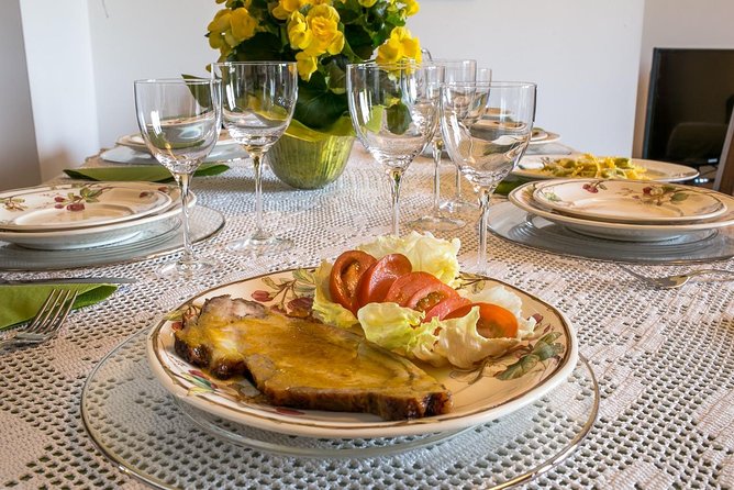 Dining experience at a local's home in Parma with show cooking - Take Home a Souvenir Apron and Shopping Bag