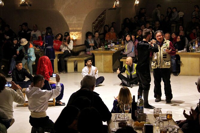 Dinner with traditional dance shows in cave restaurants - Unlimited Beverages: Sipping While Watching the Show