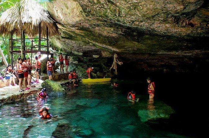 Discover a Mayan Adventure with cenotes & a lagoon. Snorkel & Buffet included. - Ziplining and Platform Dips: Adding an Adventure Element