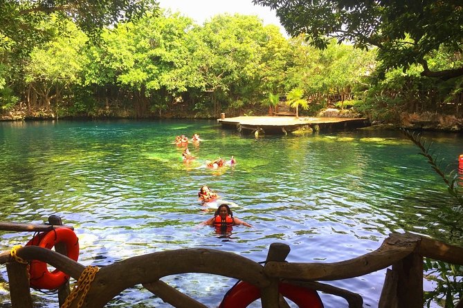 Discover a Mayan Adventure with cenotes & a lagoon. Snorkel & Buffet included. - All-Inclusive Buffet and Drinks: Enjoying a Mexican Feast