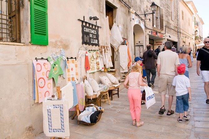 Discover Alcudia old town on a private walking tour - Main Street: Carrer Major and Local Shops