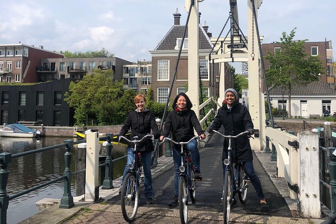 Discover Amsterdam: The Ultimate City Bike Tour - Crossing Iconic Bridges and Passing Under Famous Tunnels