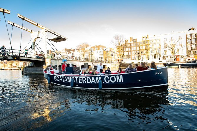 Discover Amsterdam's Canals: Relaxing Open Boat Cruise Adventure! - Exploring Amsterdams Canals on an Electric Open Boat