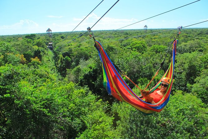 Discover an amazing world:Cenote exploration and jungle soaring. Buffet included - Jungle Ziplining and Rappelling Experience