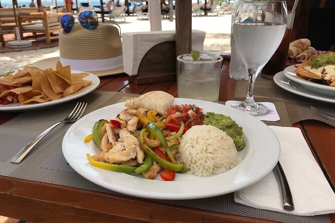 Discover Isla Mujeres in Catamaran. Buffet, Open Bar and Snorkel - Relaxing at the Private Beach Club