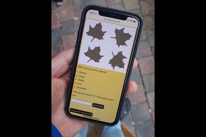 Discover Leiden with a self-guided Outside Escape city game tour! - Passing the Historic Doelenpoort Gate