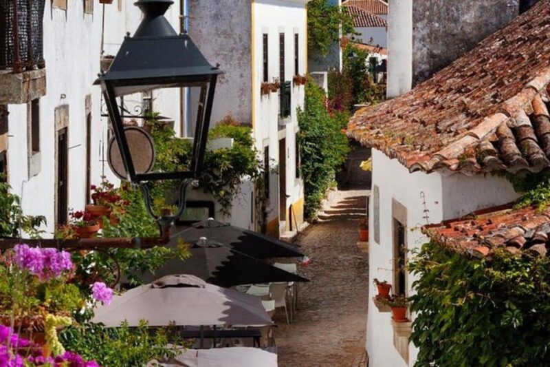 Discover the charm of Portugal, Mira de Aire Cave, Fátima, Nazaré and Obidos - Strolling Through the Medieval Charm of Óbidos