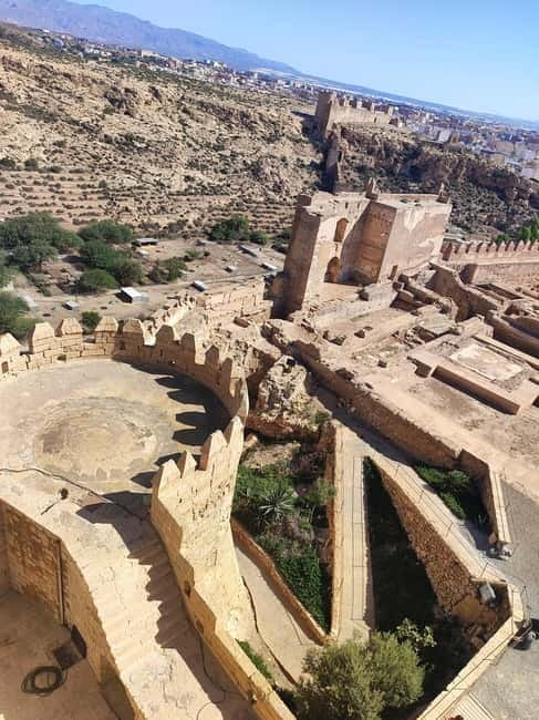 Discover the fascinating Alcazaba: History and unique views - Visiting the Cisterns, Arab Houses, and Troop Baths
