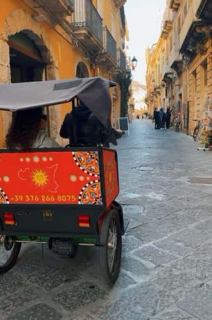 Discover the wonders of Ortigia: a Tuk-Tuk tour through history and the sea. - Accessibility and Small Group Benefits
